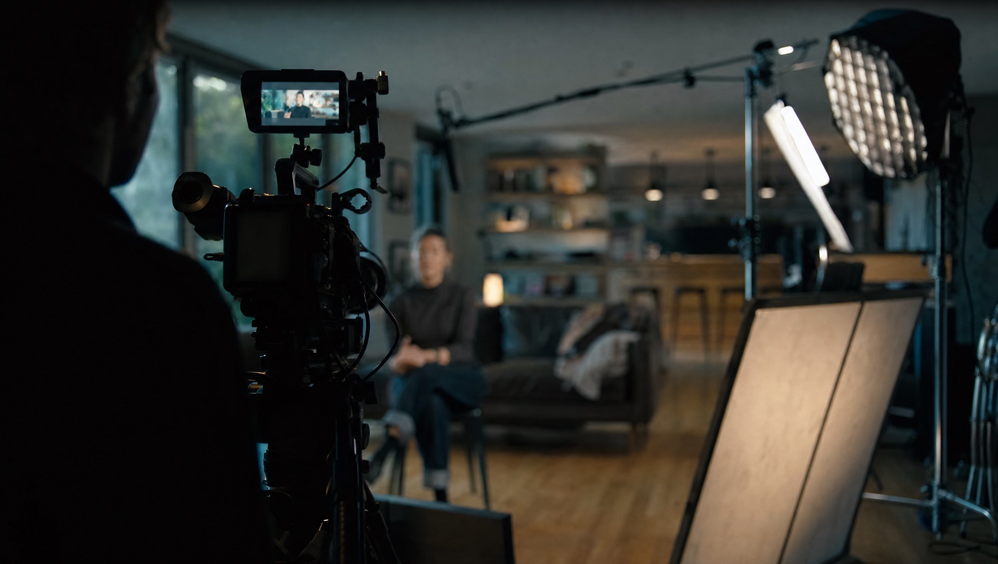 A documentary interview setup lit inside a home